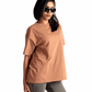 Stylera Mocha Brown oversized t-shirt worn by woman with sunglasses and gray jeans