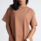 Stylera Mocha Brown oversized t-shirt worn by woman with black sunglasses
