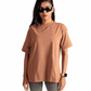Woman wearing Mocha Brown Stylera oversized t-shirt with black sunglasses and watch