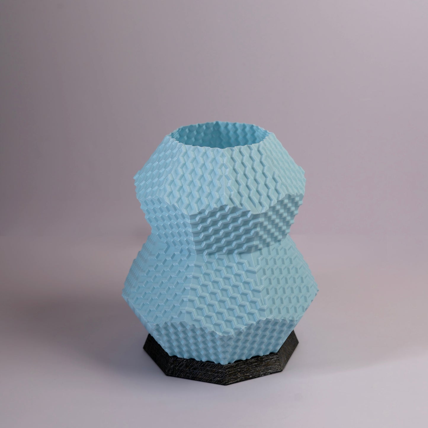 Sozori modern geometric table lamp in pastel blue with unique hexagonal design.