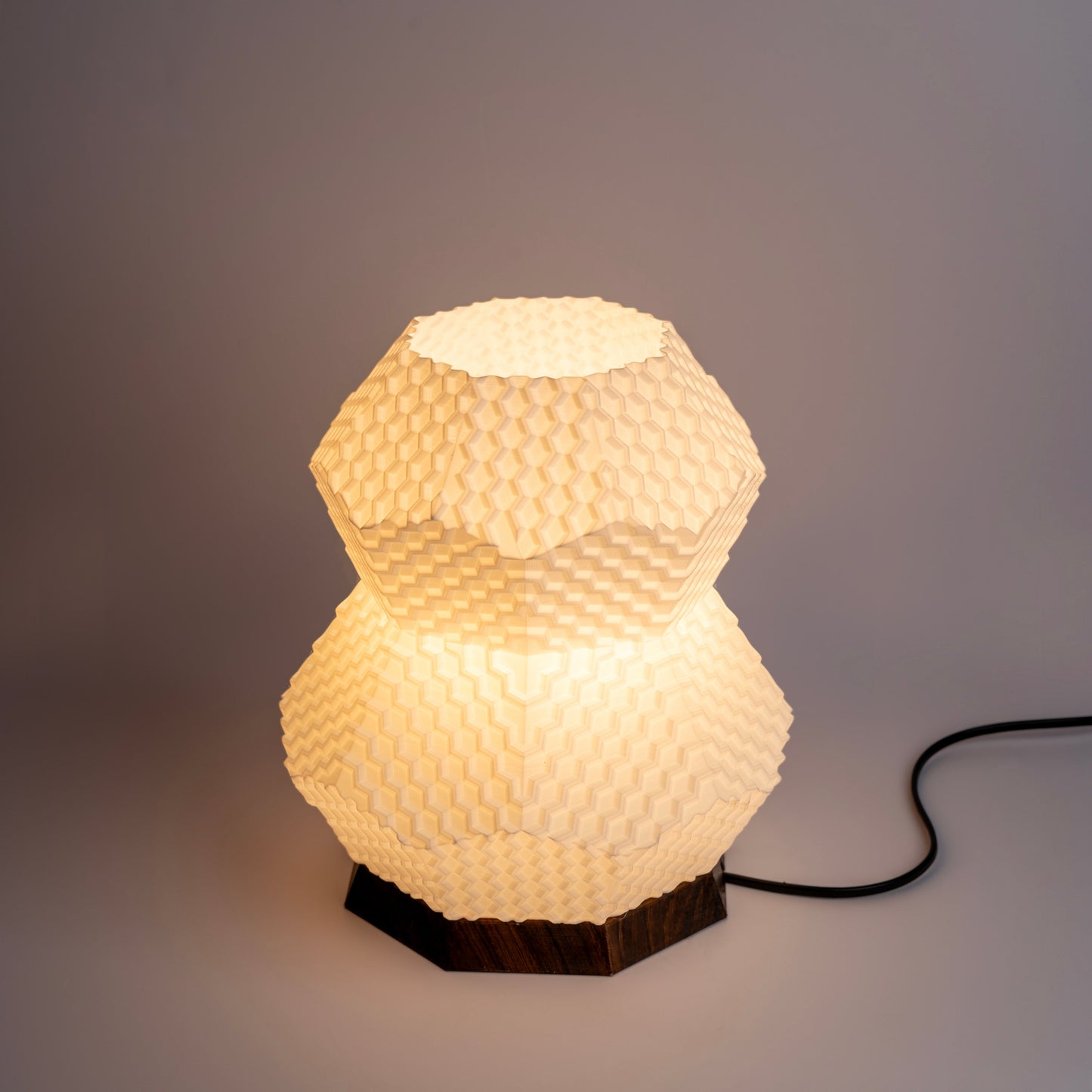Sozori modern geometric table lamp featuring a layered design and warm glow for stylish home decor