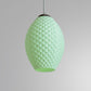 Modern pastel hanging lamp in light green with a textured design for stylish interior lighting