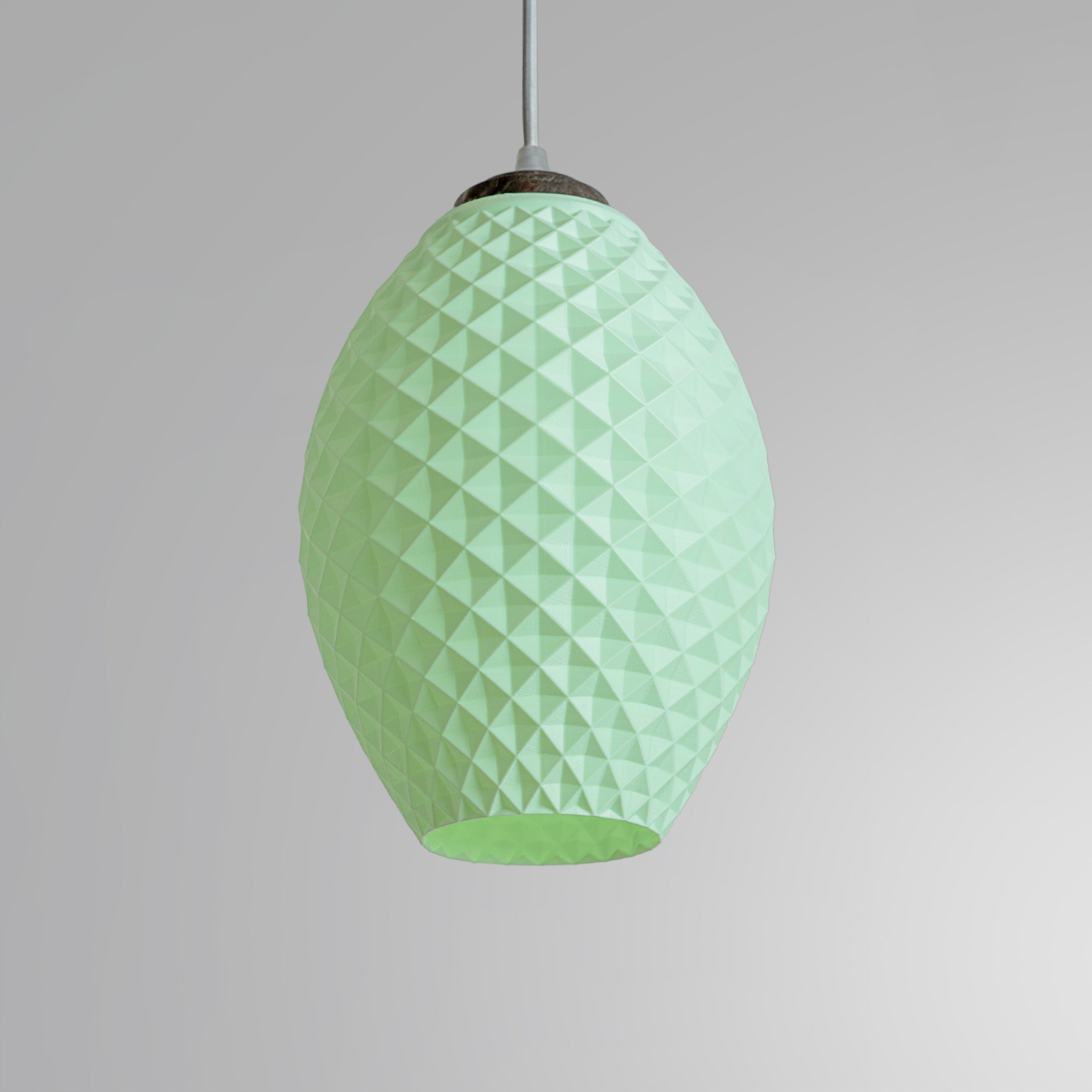Modern pastel hanging lamp in light green with a textured design for stylish interior lighting