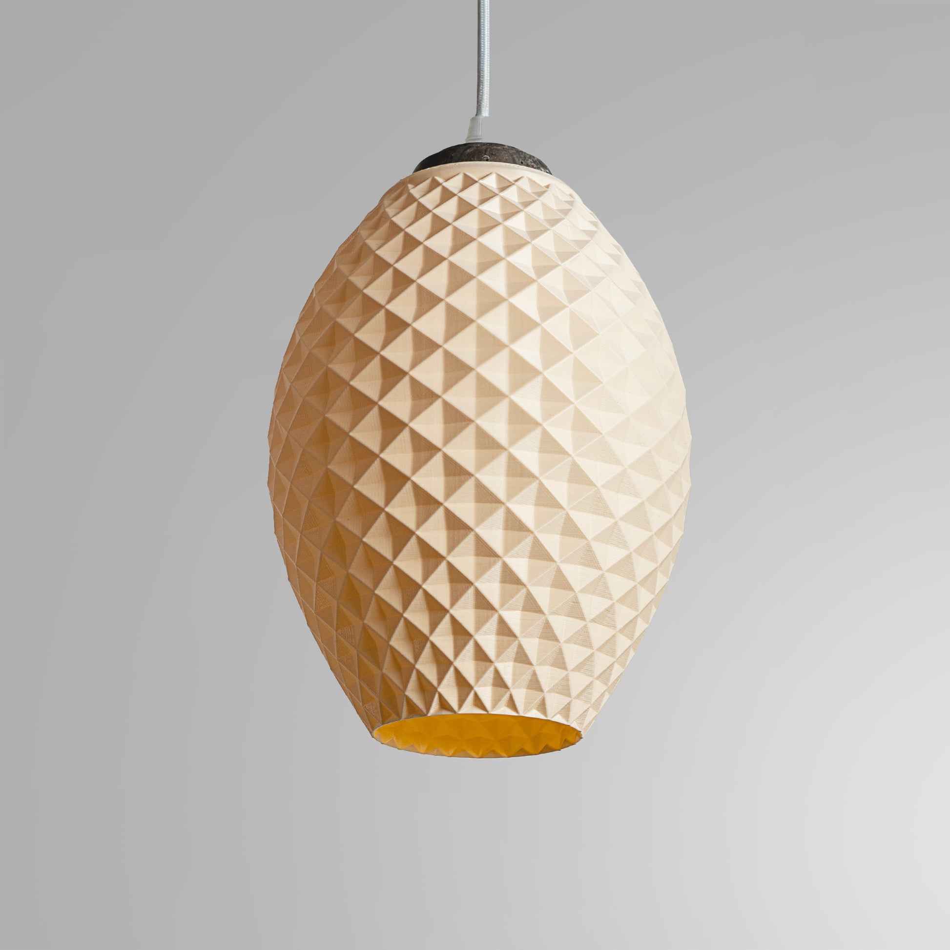 Modern pastel hanging lamp with an elegant geometric design, perfect for contemporary interiors