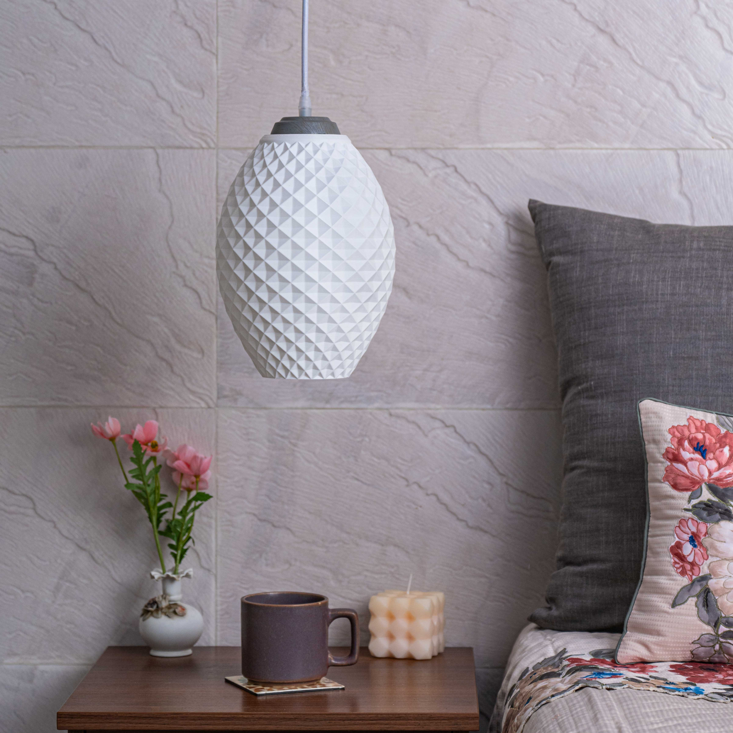 Sozori modern pastel hanging lamp with a textured design illuminating a cozy living space