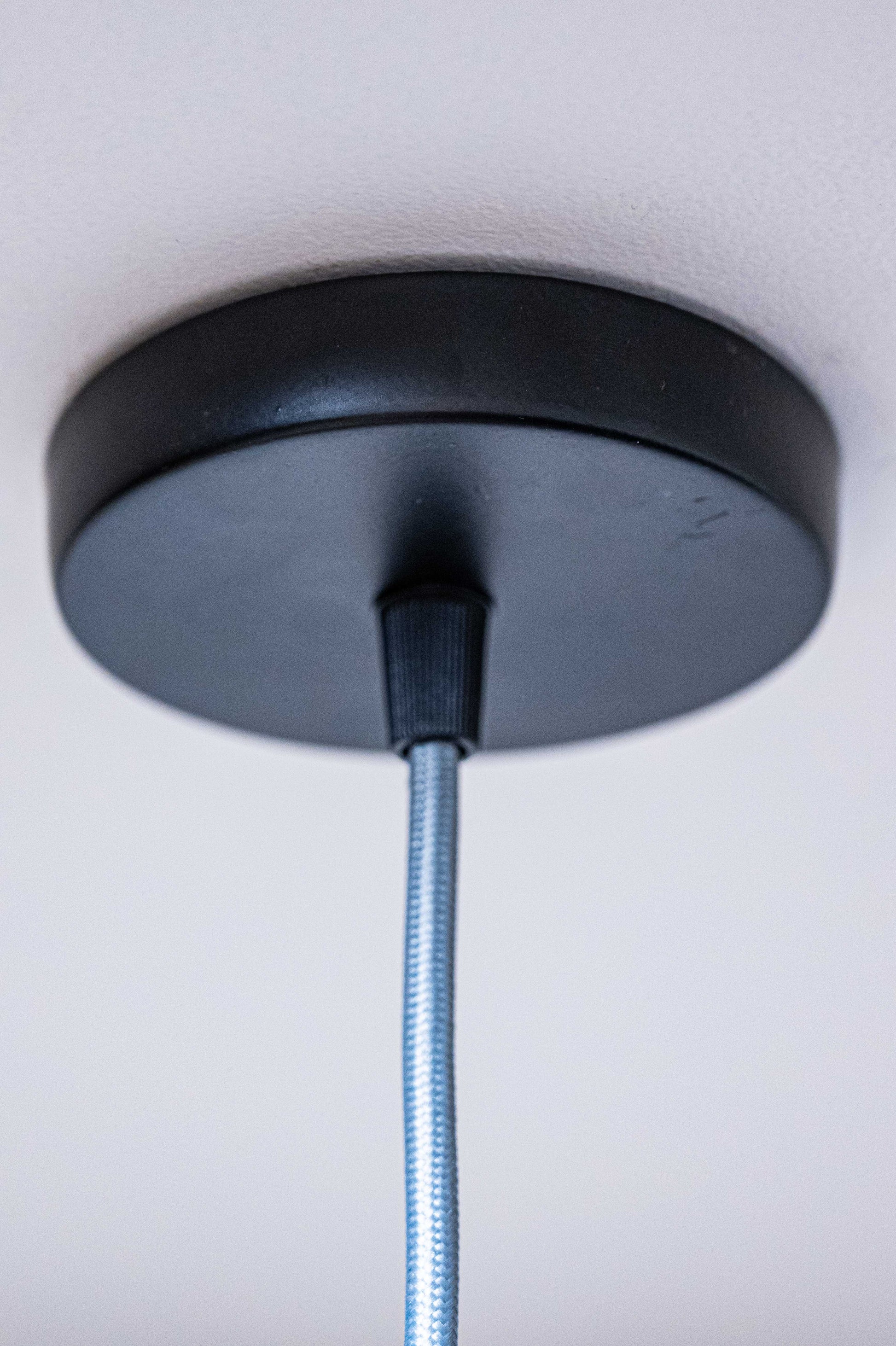 Sozori modern pastel room decor lighting with a sleek black ceiling mount and adjustable cord