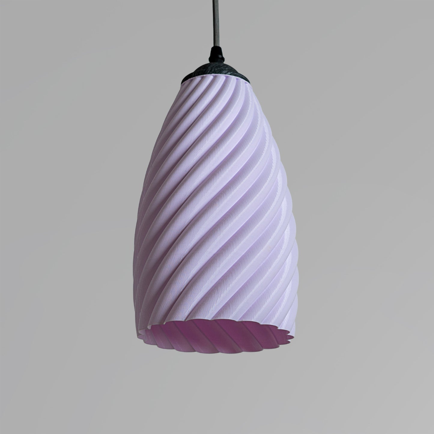 Stylish pink hanging lamp for modern pastel room decor lighting with a unique twisted design