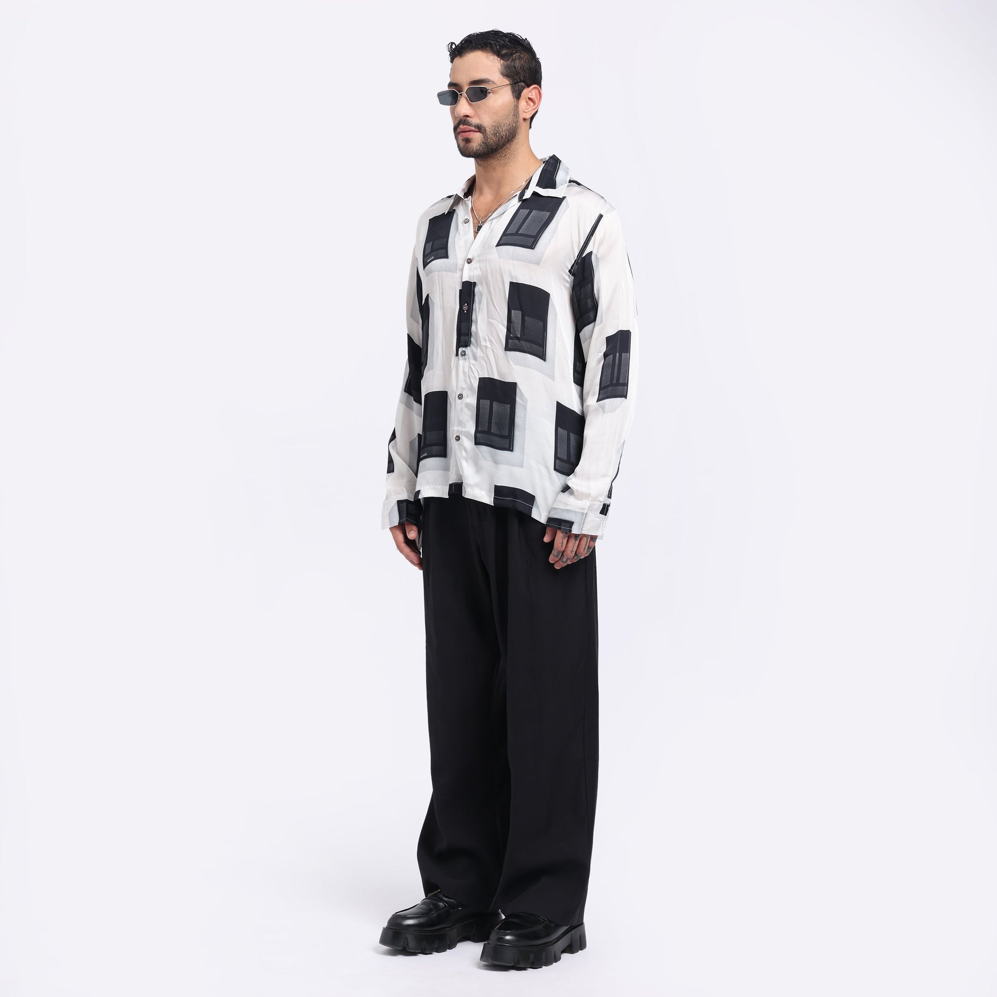 Stylera modern printed men's shirt featuring a stylish black and white geometric design