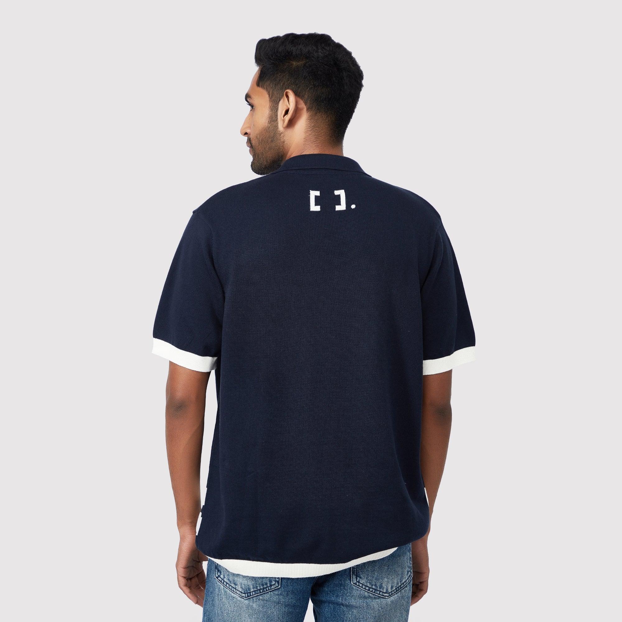 Modern short sleeve polo shirt for men in navy with a stylish design and contrasting white details