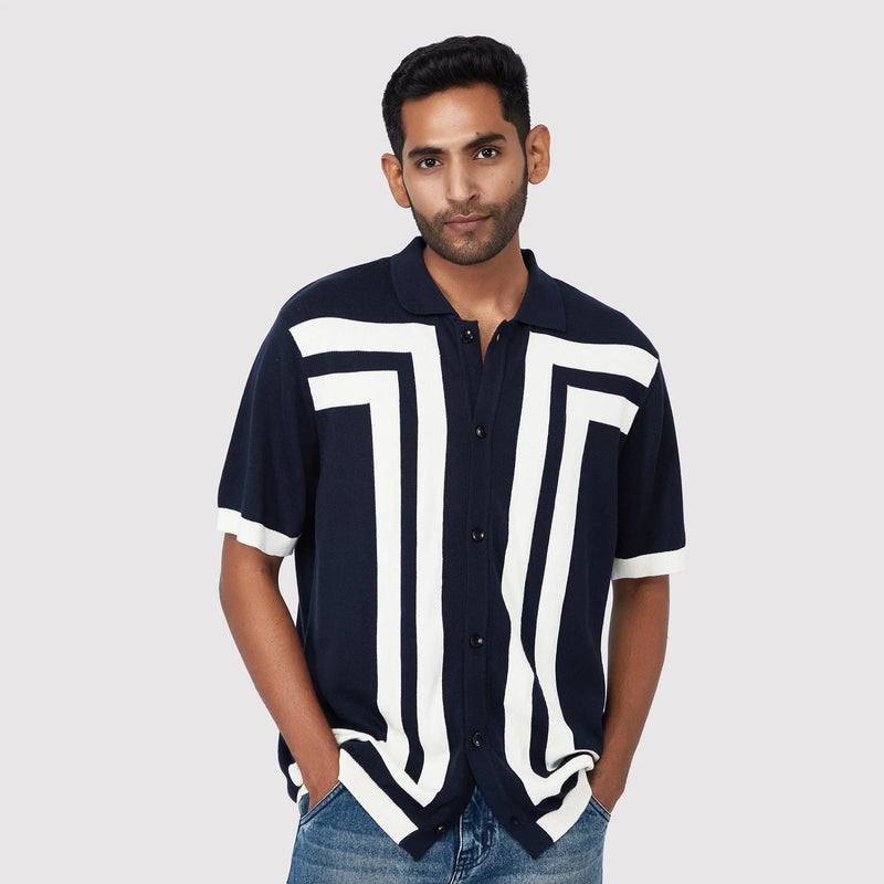 Modern short sleeve polo shirt for men in navy with bold white geometric design