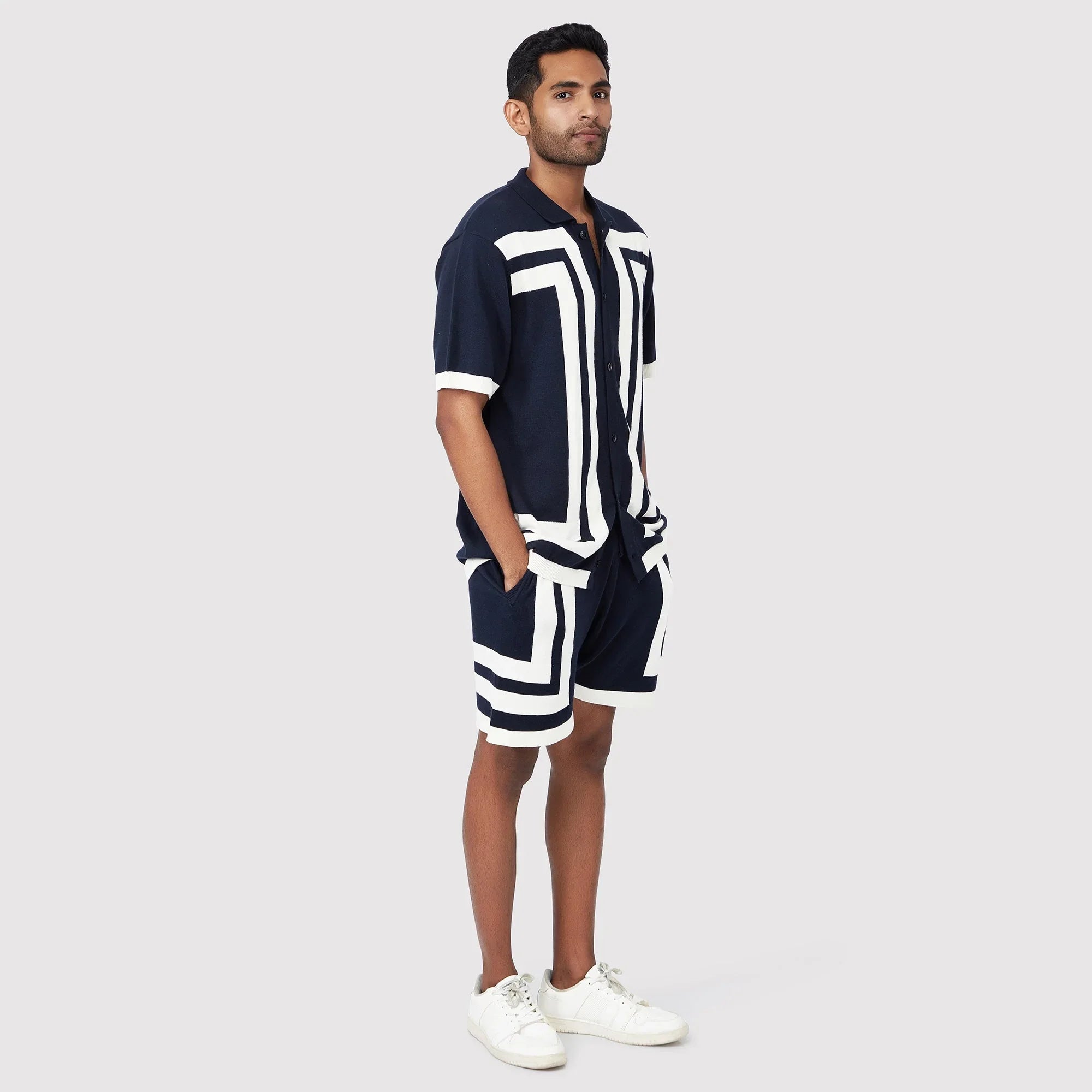 Stylish modern short sleeve polo shirt for men in navy with contrasting white design