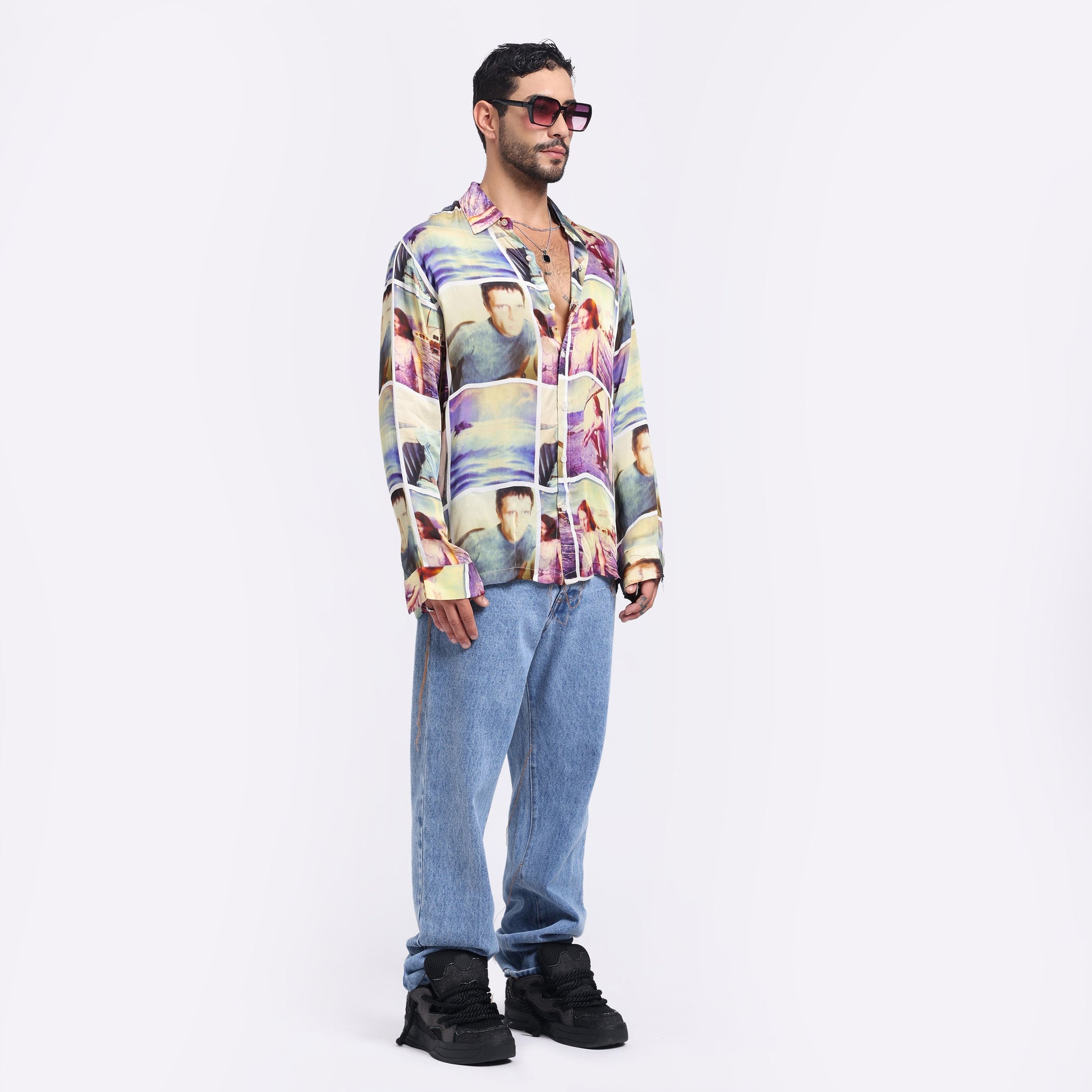 Stylera multi colored casual shirt on a model, paired with relaxed jeans and trendy sunglasses