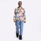 Stylera multi colored casual shirt featuring a vibrant print, paired with relaxed jeans and stylish sunglasses