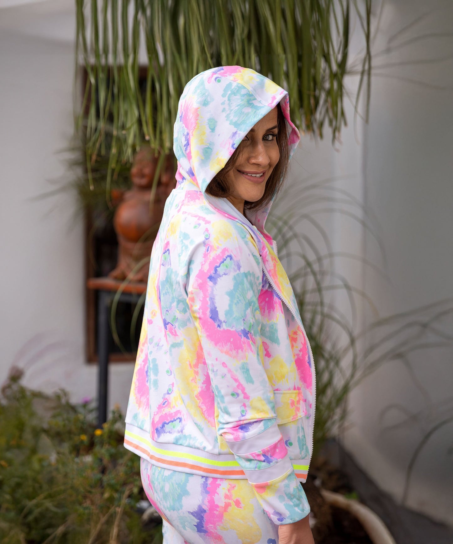 Stylera multicolor neon jacket and joggers set featuring a stylish hood and vibrant design
