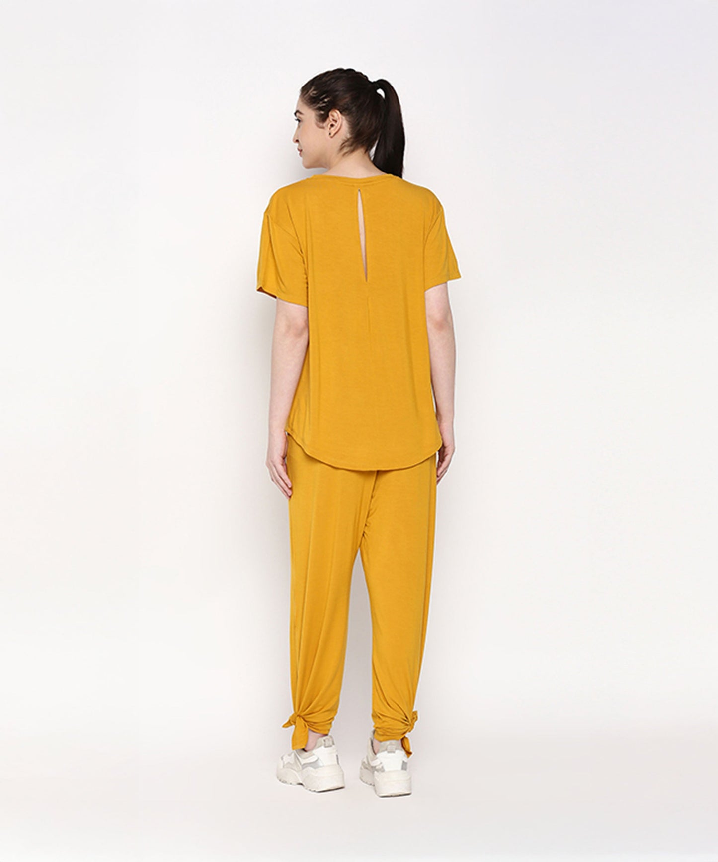 Mustard two piece set for women featuring a stylish top and comfortable pants