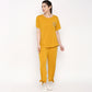Mustard two piece set for women featuring a comfy top and pants with side ties
