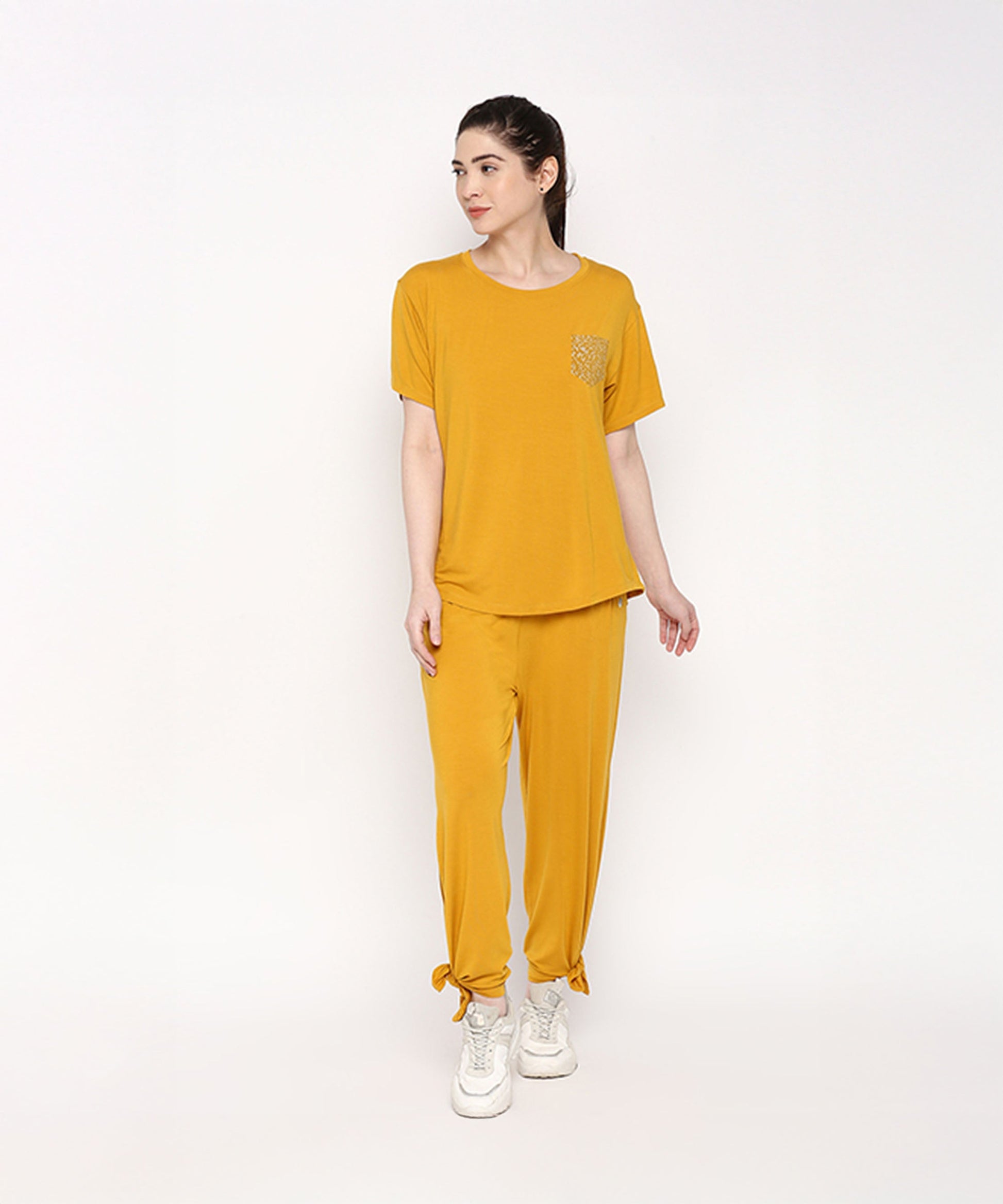 Mustard two piece set for women featuring a comfy top and pants with side ties