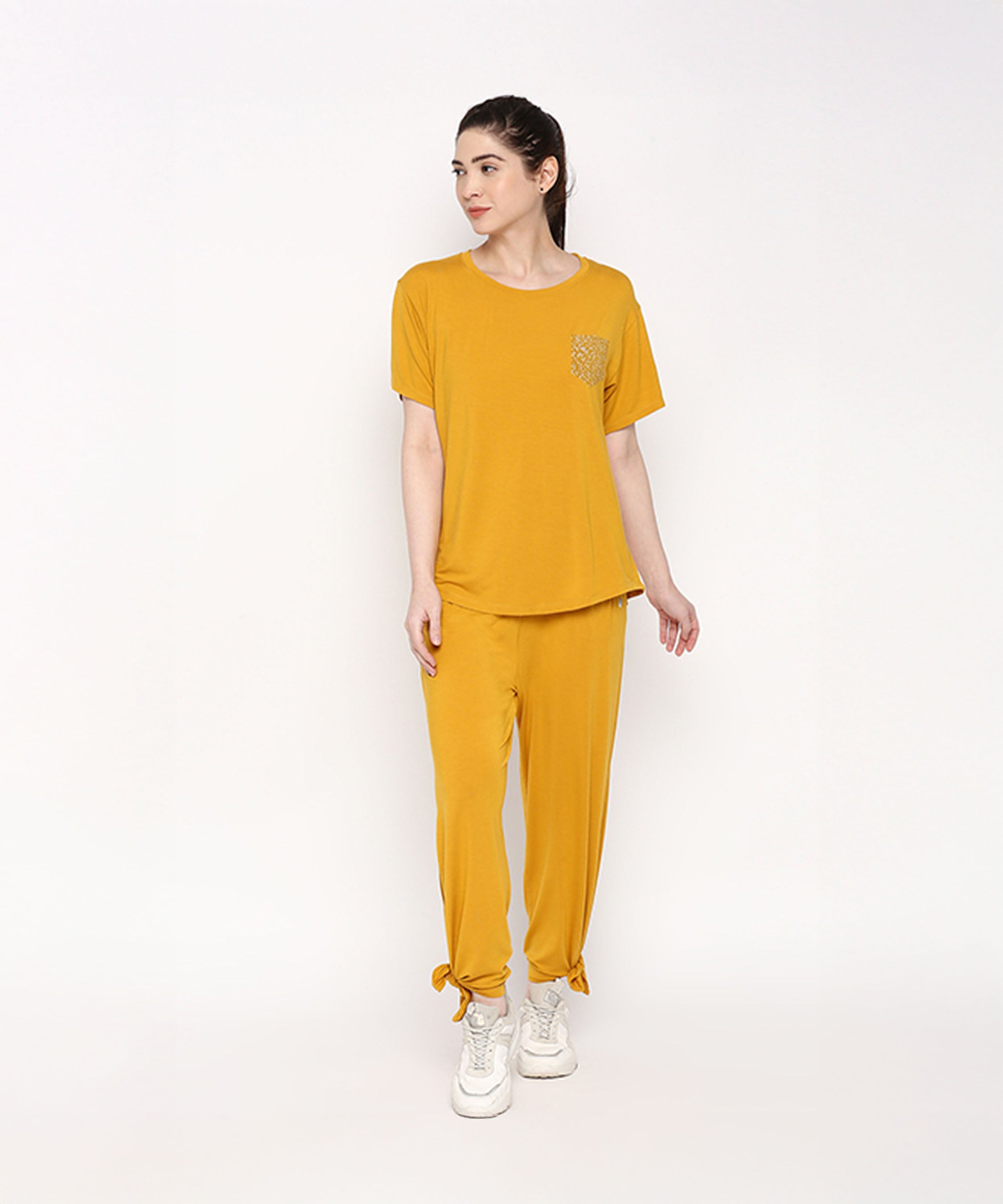 Mustard two piece set for women featuring a comfy top and pants with side ties