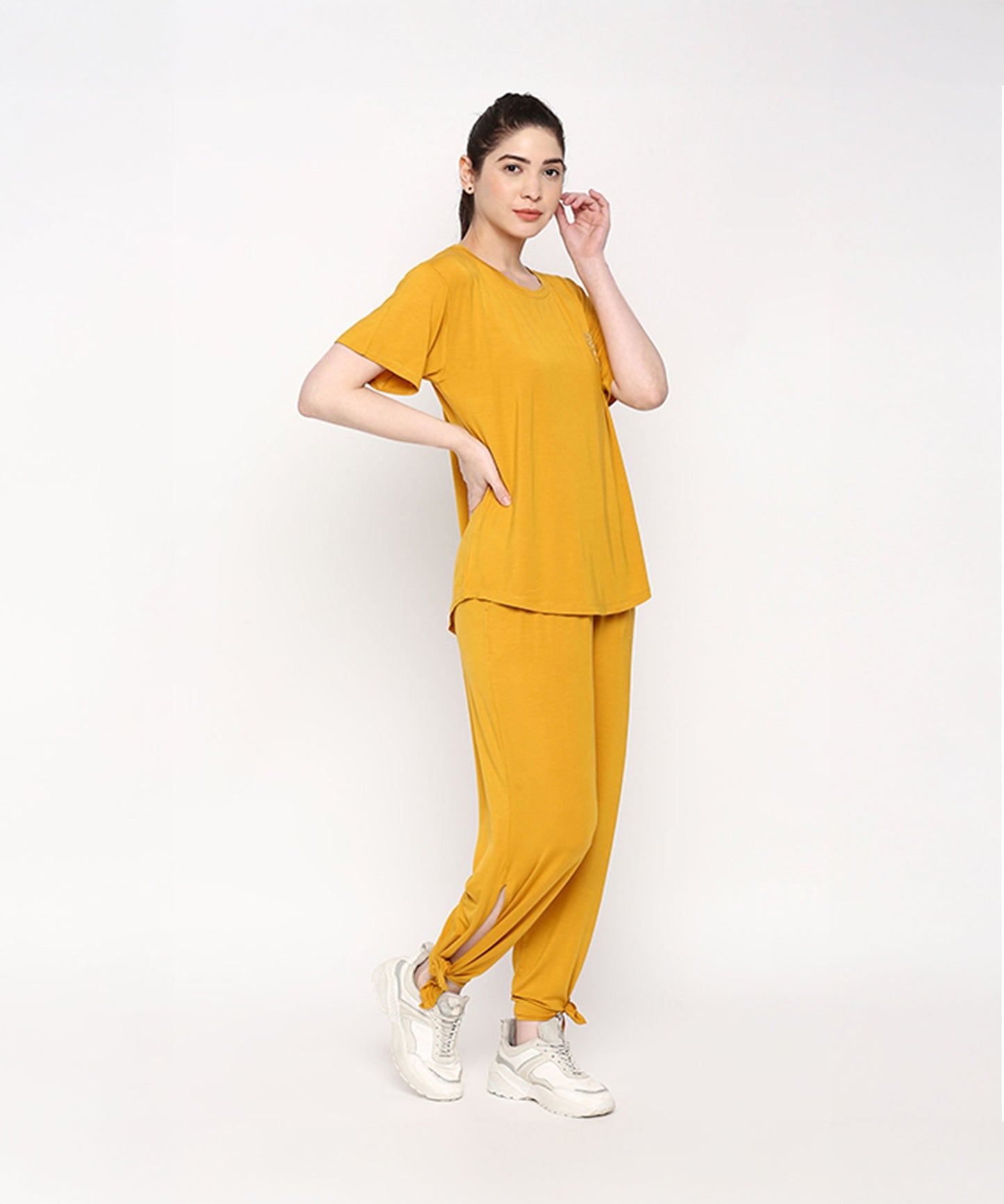 Stylish mustard two piece set for women featuring a relaxed top and tapered pants