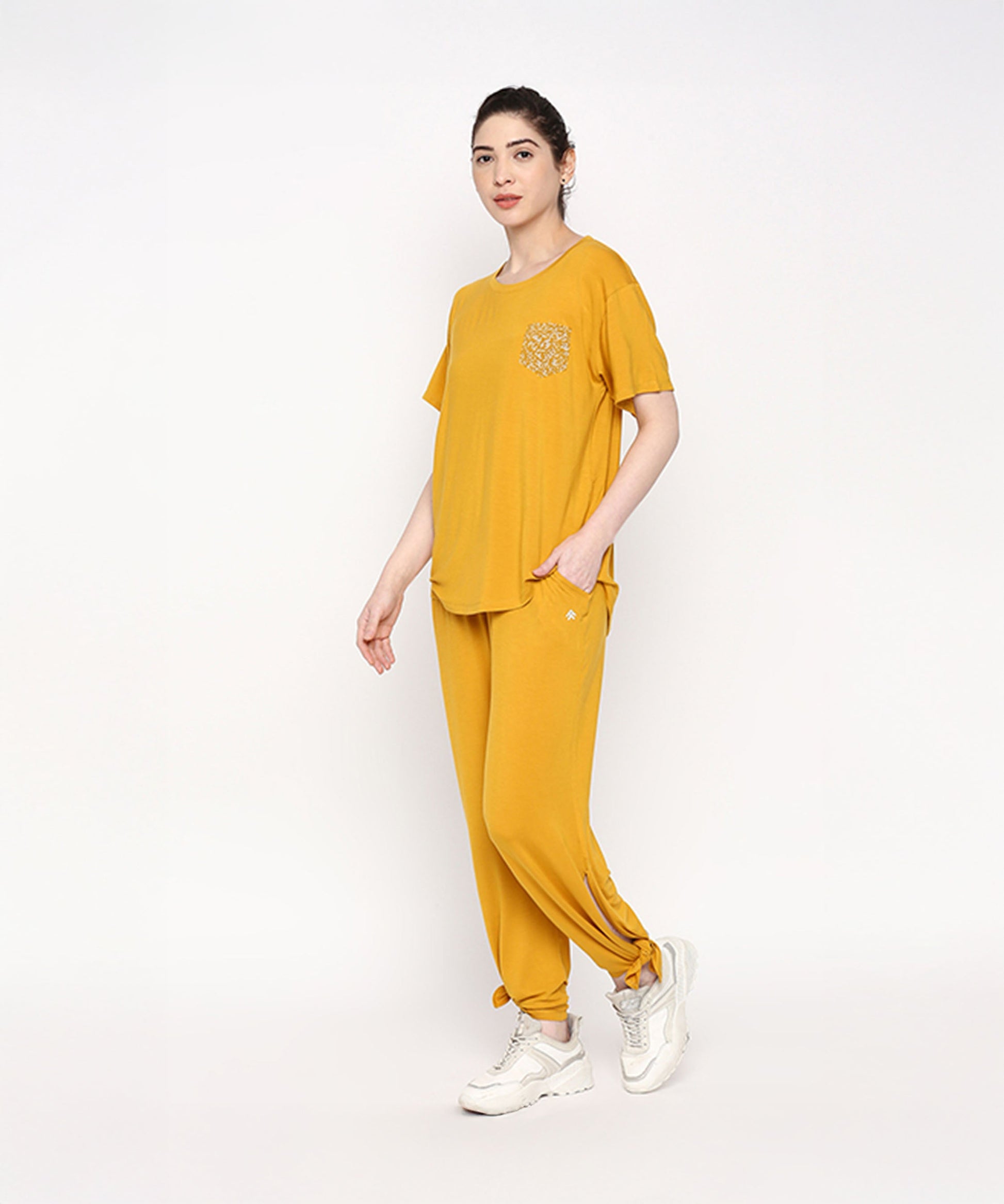 Mustard two piece set for women featuring a comfy tee and matching joggers
