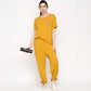 Stylish mustard two piece set for women featuring a relaxed fit top and joggers with a pocket