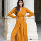 Mustard wrap dress with long sleeves and a tie waist, perfect for casual or formal occasions