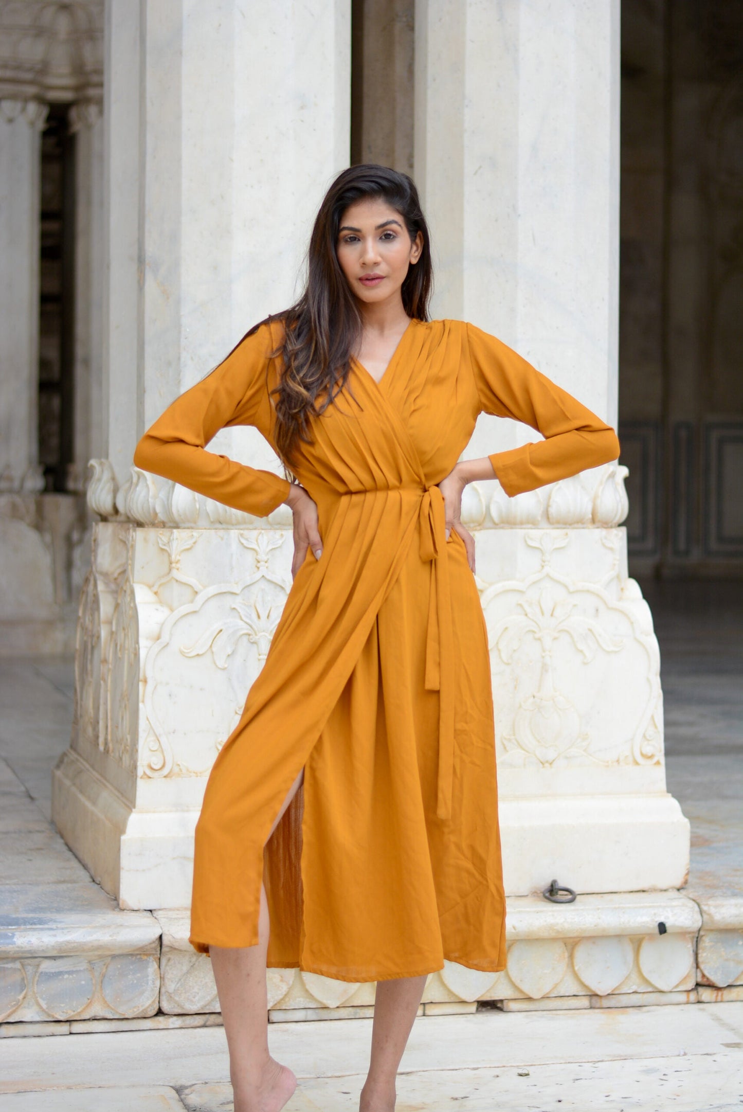 Mustard wrap dress with long sleeves and a tie waist, perfect for casual or formal occasions