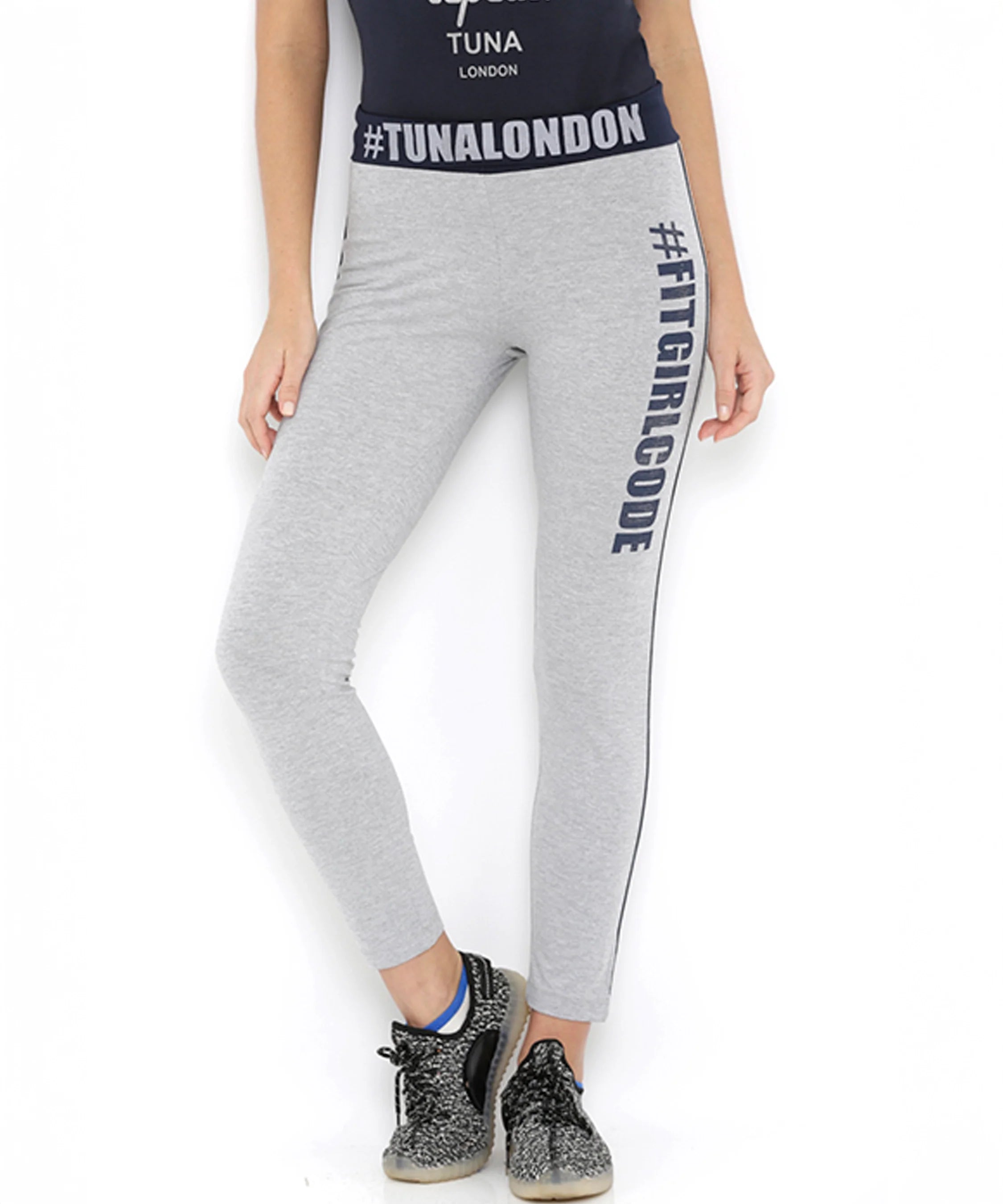 Gray Stylera narrow fit track pants with stylish branding and a comfortable waistband