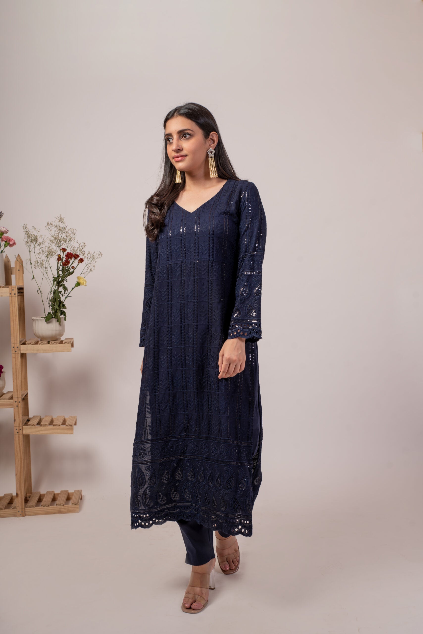 Elegant navy blue chikankari kurta set with intricate embroidery and a graceful silhouette