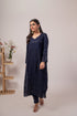 Elegant navy blue chikankari kurta set with intricate embroidery and a graceful silhouette