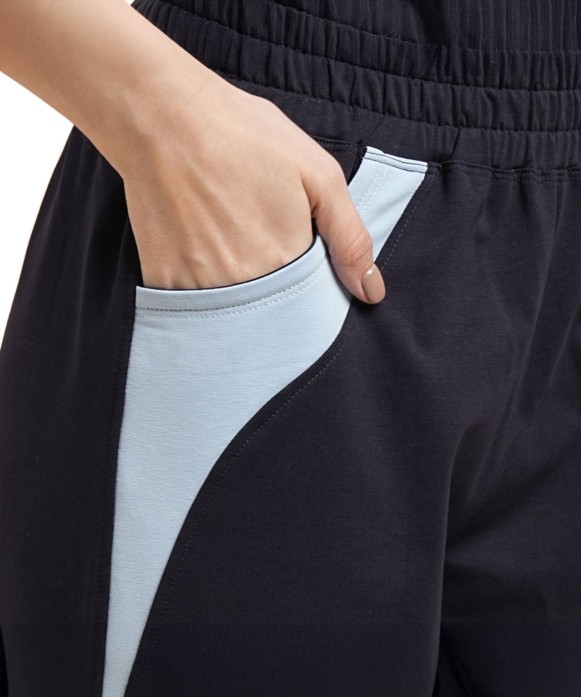 Navy blue joggers for women featuring a stylish design and convenient side pockets