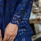 Detail of a navy blue three piece co-ord set with intricate lace and sequin designs