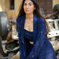 Navy blue three piece co-ord set featuring a stylish top, jacket, and pants for a chic look