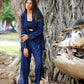 Stylish navy blue three piece co-ord set featuring a top, jacket, and pants, perfect for casual outings
