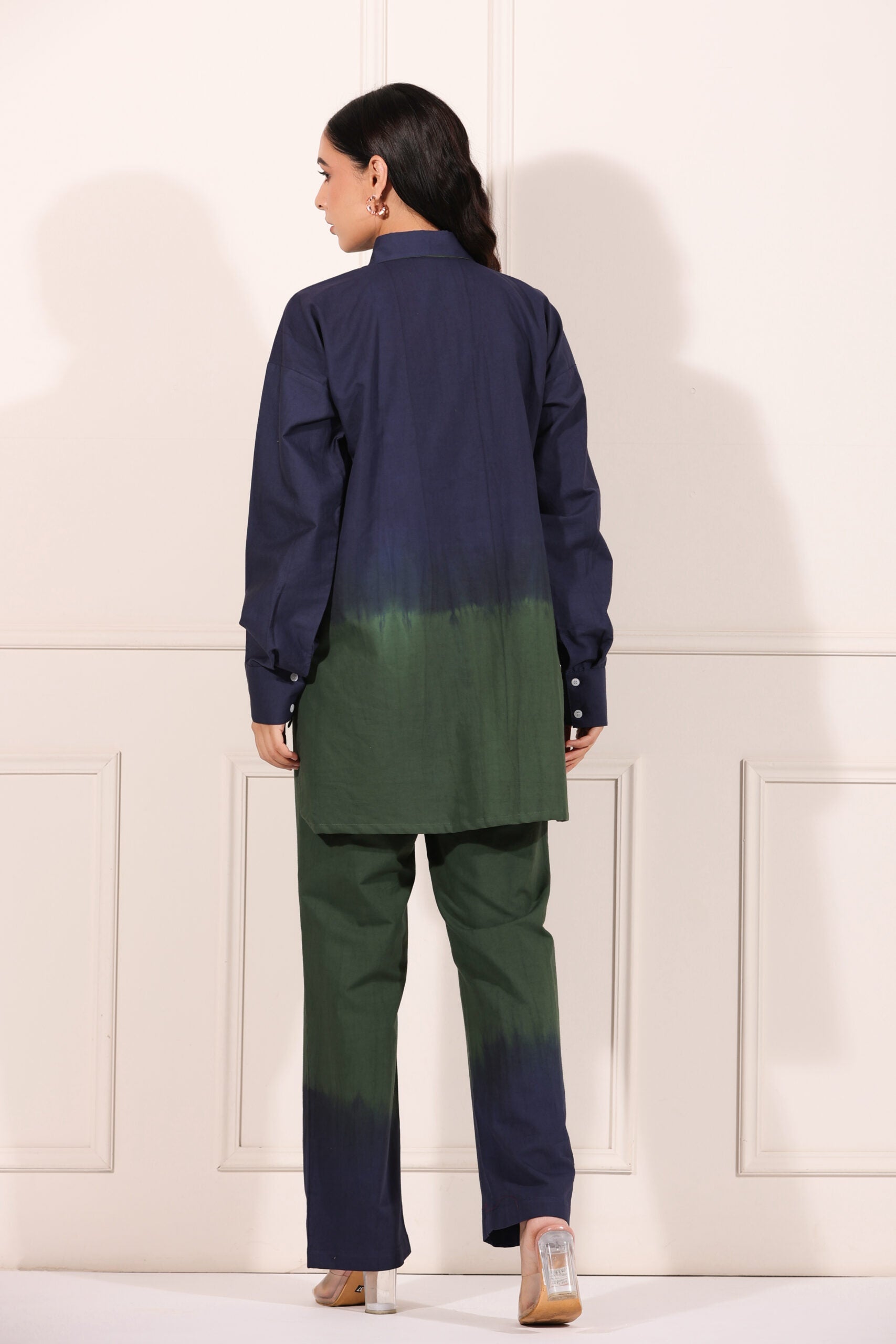 Navy green two piece matching set featuring a shirt and pants with a stylish ombre design