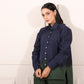 Navy green two piece matching set featuring a stylish button-up shirt and sleek pants