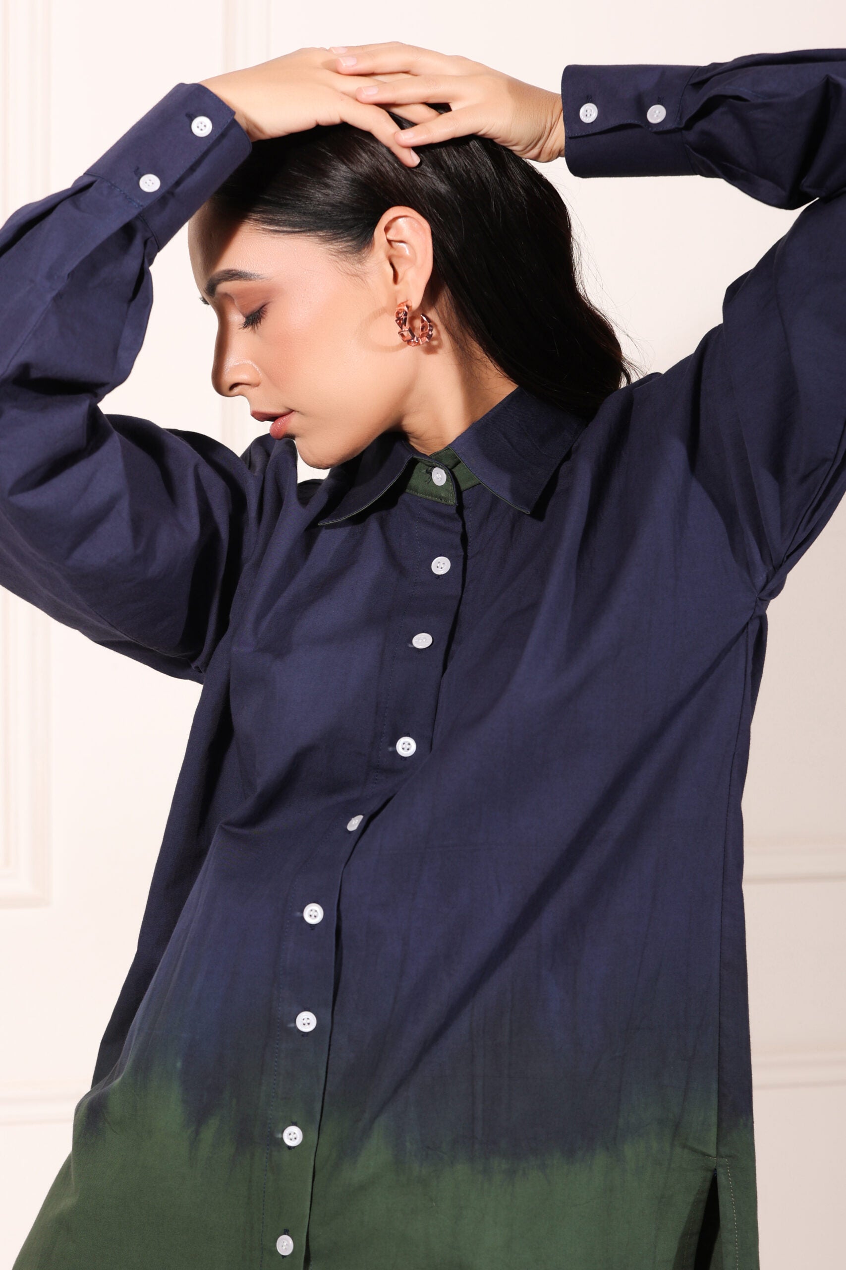 Navy green two piece matching set featuring a stylish shirt with a gradient design