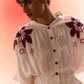 Off white embroidered cord set with purple floral embroidery and button details by Western Era