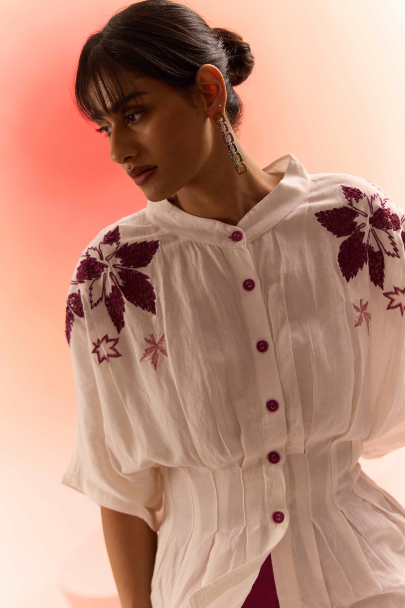 Off white embroidered cord set with purple floral embroidery and button details by Western Era