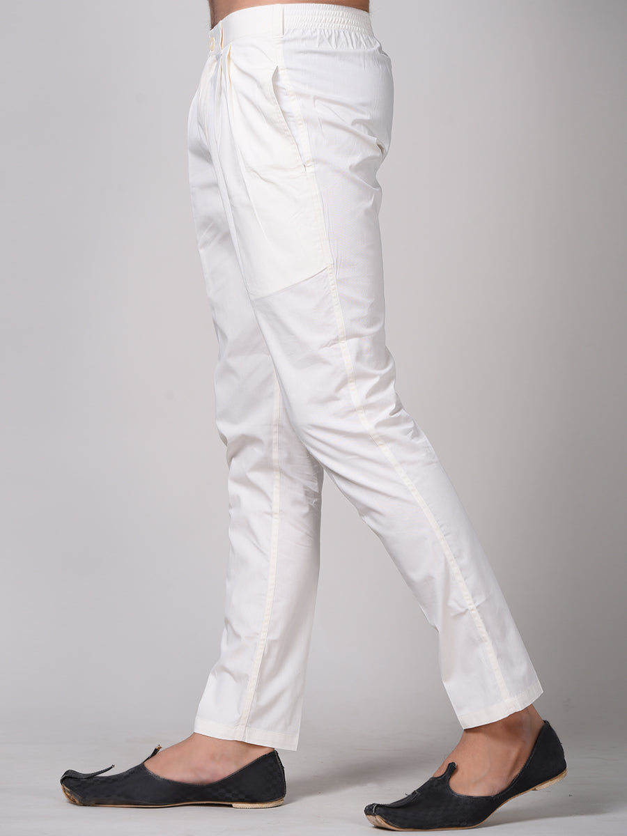 Stylish off white pyjama pants with a slim fit and elastic waistband for comfortable wear