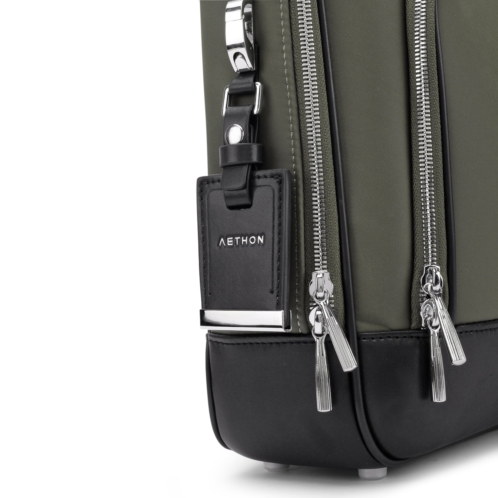 Stylera olive briefcase for men close up of olive canvas and black leather base with silver zippers and tag