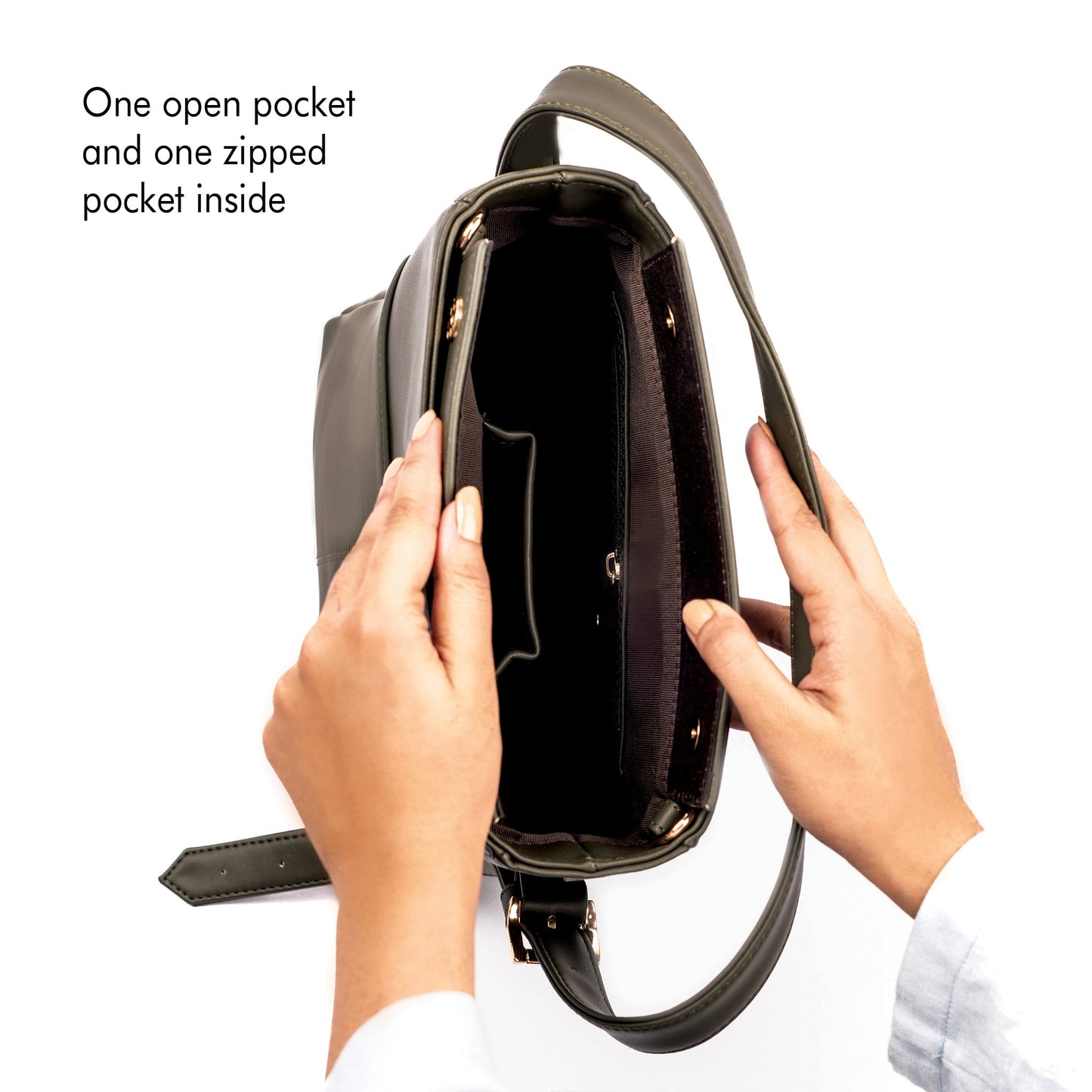 Inside view of an olive green bucket bag with one open pocket and one zipped pocket