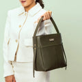 Stylish olive green bucket bag by Stylera with sleek design and comfortable handle