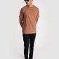 Man wearing Stylera brown regular fit casual tee with black pants and sunglasses