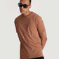 Stylera regular fit casual tee in brown worn by man with black sunglasses and black pants