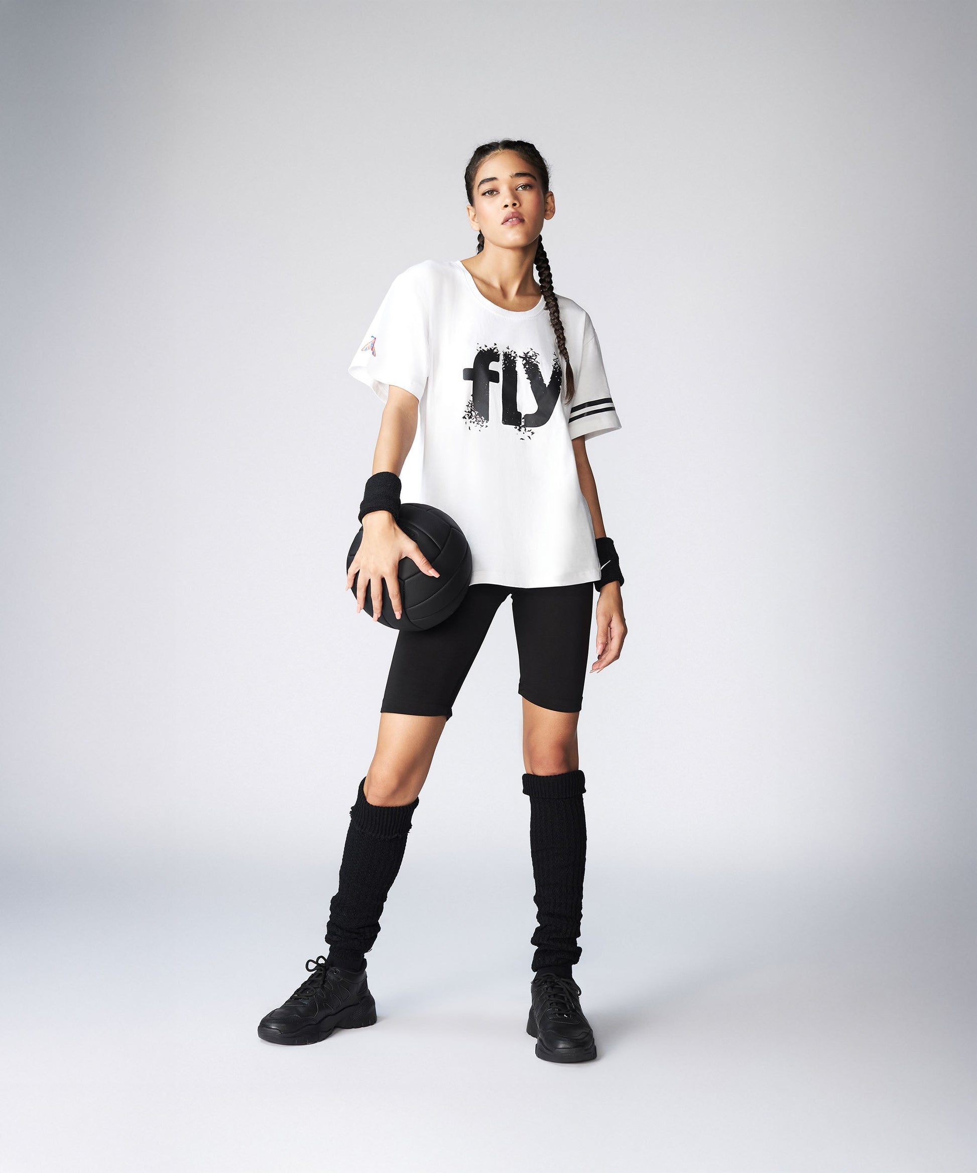 Stylera oversize fly tee in white with bold graphic print for a trendy athletic look
