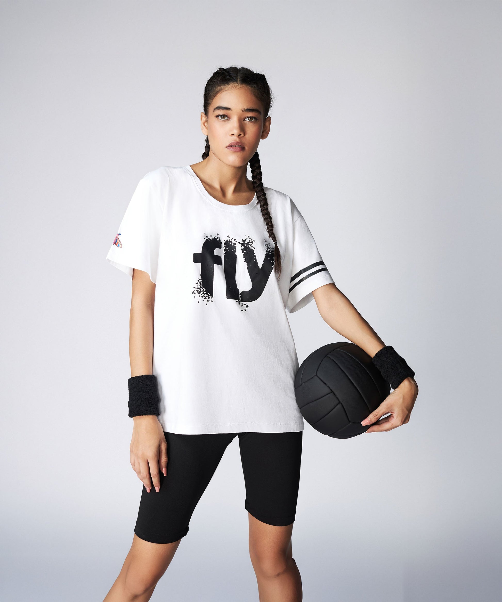 Stylera Women's Oversize Fly Tee in White with Bold Graphic Design and Sporty Details