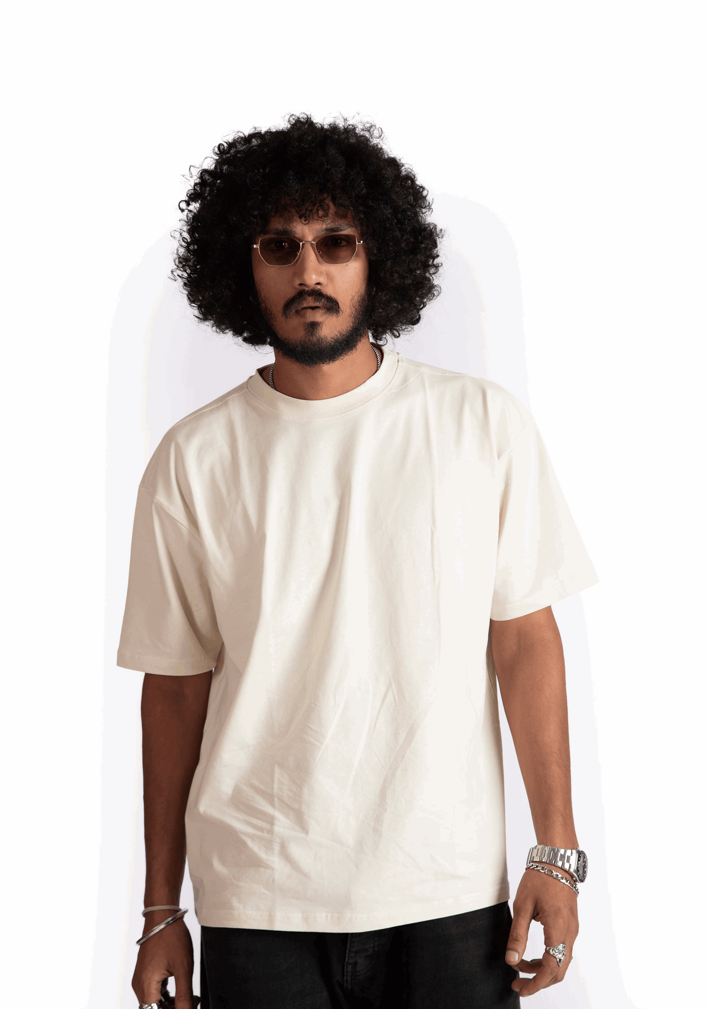 Man wearing Stylera oversized almond milk t-shirt with short sleeves and relaxed fit