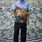 Model wearing oversized floral button up shirt by Stylera with colorful nature print