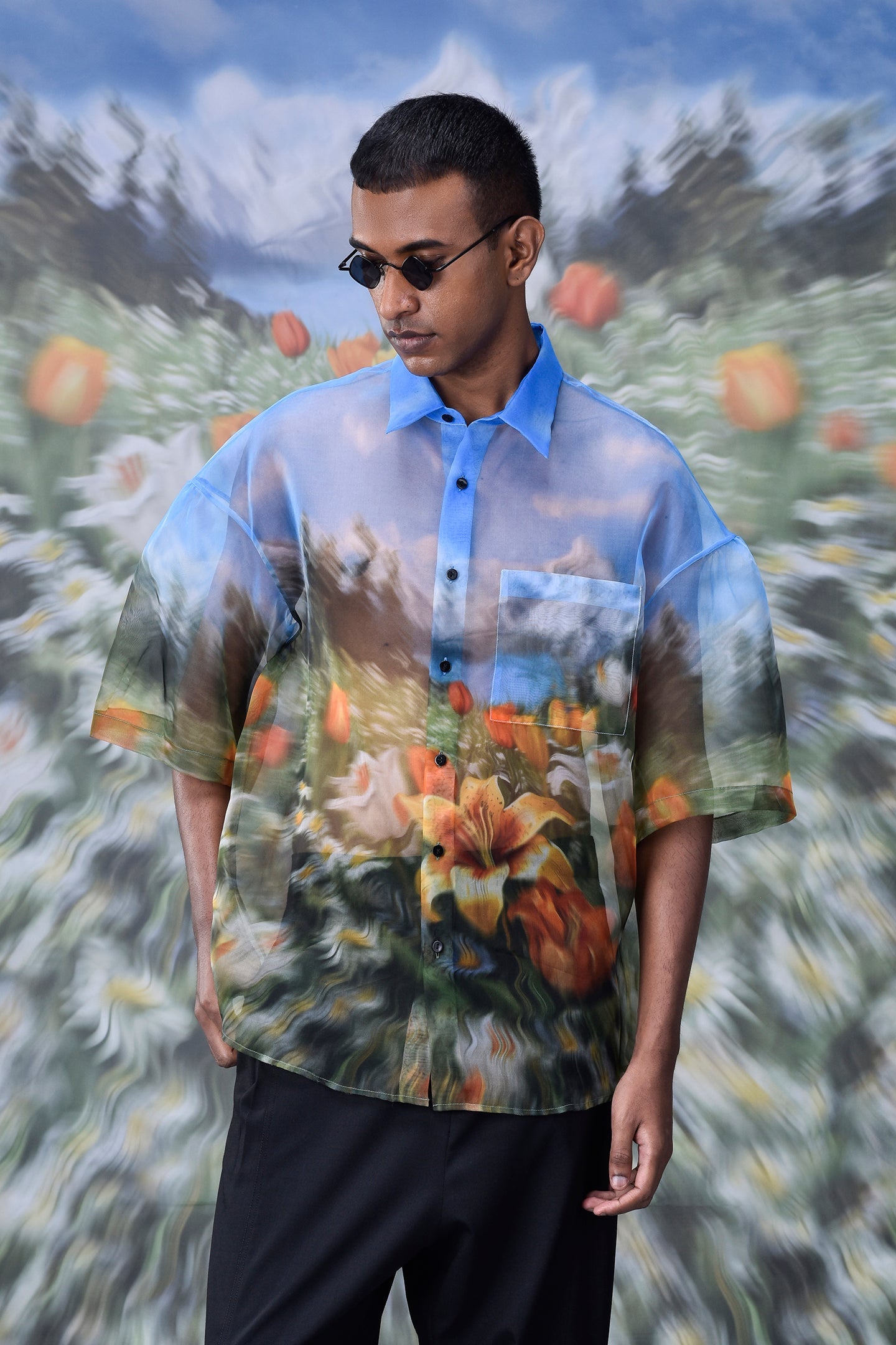 Mens oversized floral button up shirt by Stylera with vibrant nature-inspired print